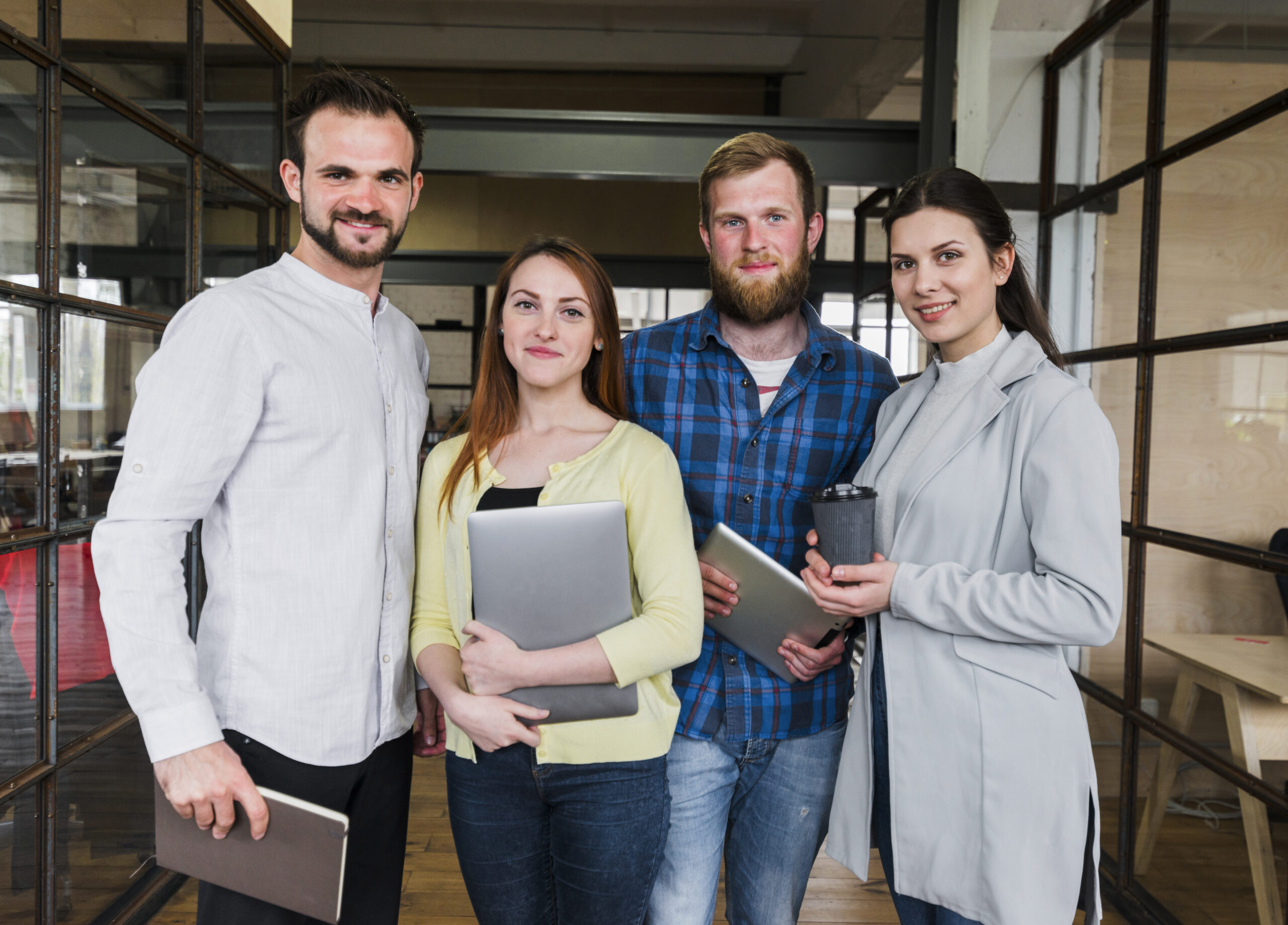 company colleagues stand with confident expression